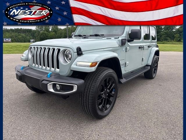 2023 Jeep Wrangler 4xe Sahara 4x4 in Earl Clearcoat — front three-quarter view