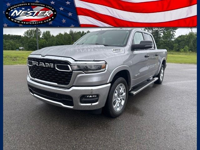 2026 RAM 1500 Big Horn Crew Cab 4x4 5'7' Box in Billet Silver Metallic Clearcoat — front three-quarter view