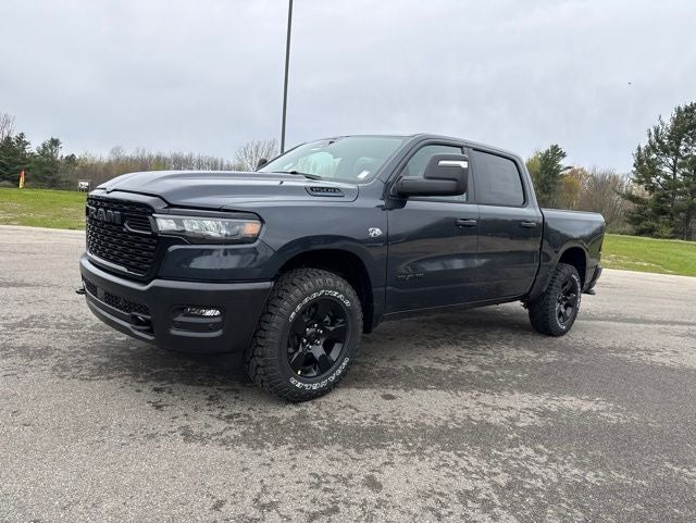 2026 RAM Ram 1500 RAM 1500 WARLOCK CREW CAB 4X4 5'7' BOX in Forged Blue Metallic Exterior Paint — front three-quarter view