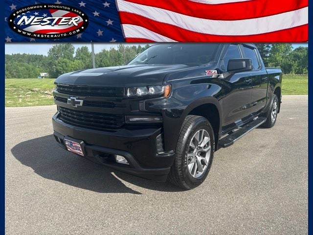 2021 Chevrolet Silverado 1500 4WD Crew Cab Short Bed RST in Black — front three-quarter view