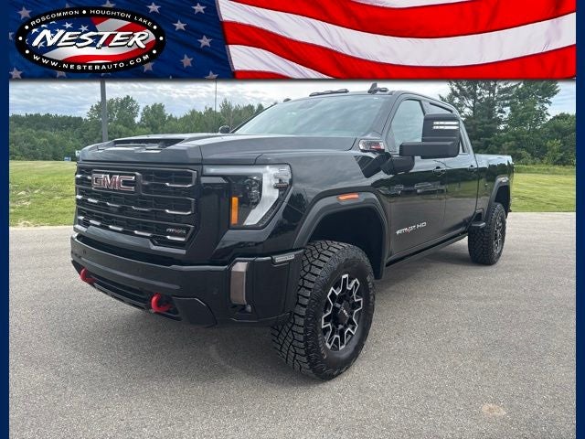 2024 GMC Sierra 2500HD AT4X in Onyx Black — front three-quarter view
