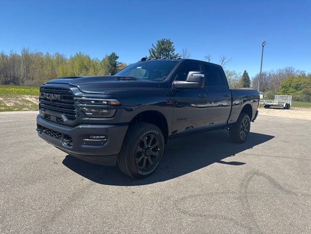 2026 RAM Ram 2500 RAM 2500 LARAMIE CREW CAB 4X4 6'4' BOX in Forged Blue Metallic Exterior Paint — front three-quarter view