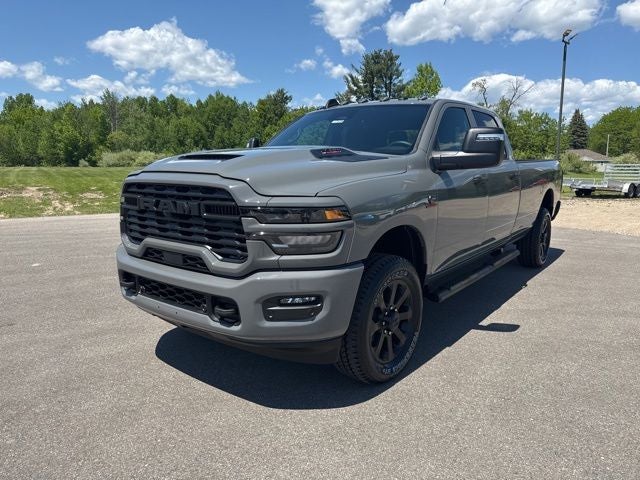 2026 RAM Ram 2500 RAM 2500 BLACK EXPRESS CREW CAB 4X4 8' BOX in Ceramic Gray Clear-Coat Exterior Paint — front three-quarter view