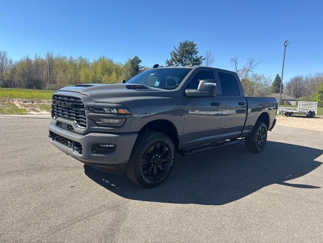 2026 RAM Ram 2500 RAM 2500 BLACK EXPRESS CREW CAB 4X4 6'4' BOX in Ceramic Gray Clear-Coat Exterior Paint — front three-quarter view
