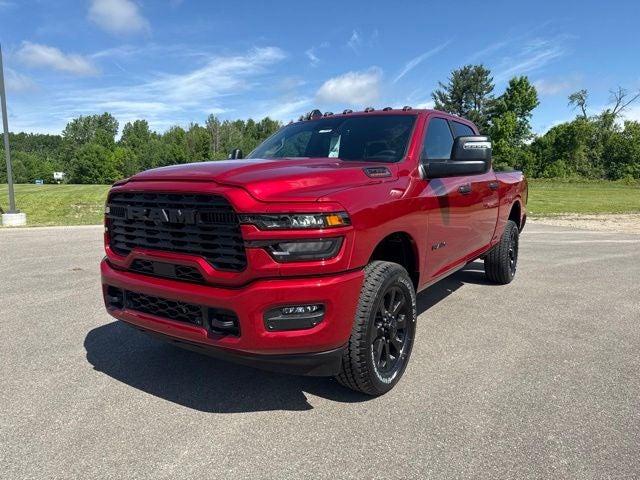 2026 RAM Ram 2500 RAM 2500 BIG HORN CREW CAB 4X4 6'4' BOX in Molten Red Pearl-Coat Exterior Paint — front three-quarter view