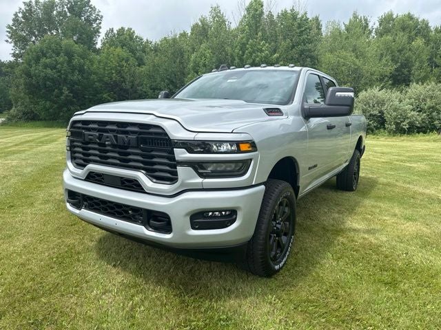 2026 RAM Ram 2500 RAM 2500 BIG HORN CREW CAB 4X4 6'4' BOX in Silver-Zynith Exterior Paint — front three-quarter view