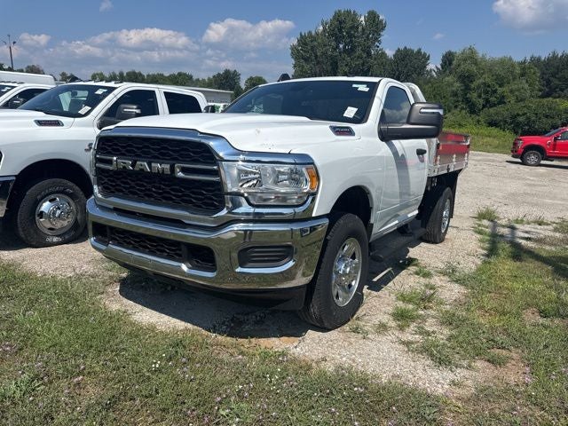 2024 RAM Ram 2500 RAM 2500 TRADESMAN CREW CAB 4X4 8' BOX in Bright White Clear-Coat Exterior Paint — front three-quarter view