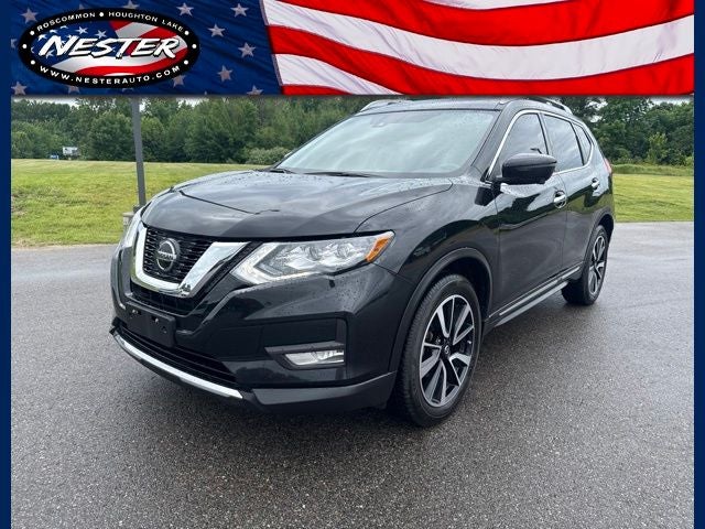 2020 Nissan Rogue S Intelligent AWD in Magnetic Black Pearl — front three-quarter view